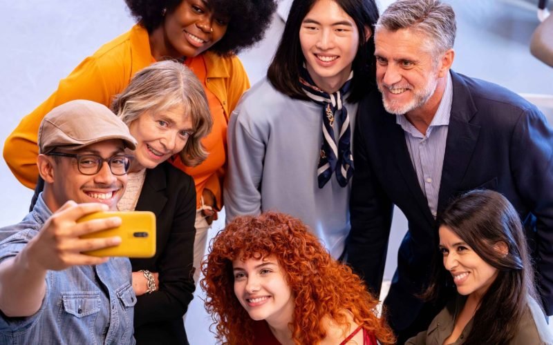 diverse-business-people-taking-a-selfie-together-i-2024-11-27-21-03-00-utc (1)